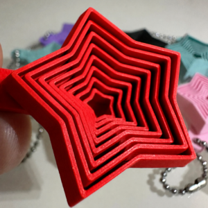 Yıldız Fidget Anahtarlık – Hareketli Stres Oyuncağı ve Çanta Aksesuarı-Kırmızı
