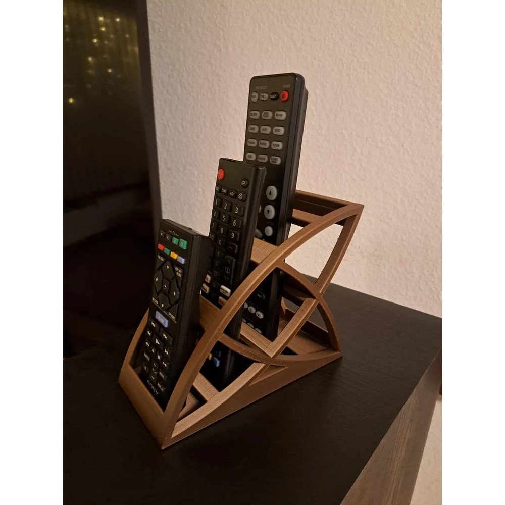 Dört Kumandalık Kavisli Kumanda Standı Modern Yaprak Formlu Kumanda Tutucu Bronz